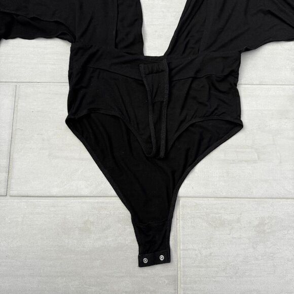 Jane Plus One Bodysuit Deep Plunge Open Back Bat Wings Black Top Button Closure - Picture 8 of 8